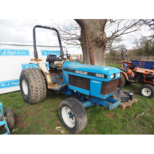 2056 - New Holland 1920 compact tractor with roll bar and grass tyres. Key in office
