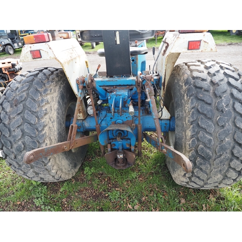 2056 - New Holland 1920 compact tractor with roll bar and grass tyres. Key in office