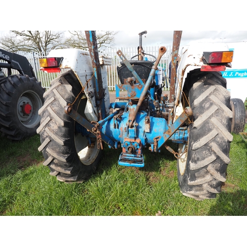 2064 - Ford 4600 tractor with front inside wheel weights. Runs and drives