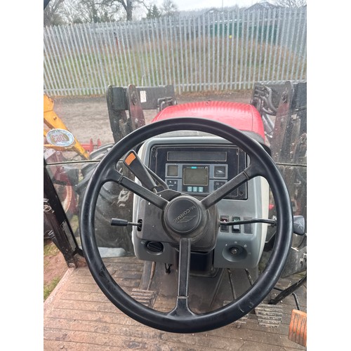 2063 - McCormick MC115 4WD tractor with Quicke Q770 loader . Reg. CX04 EMV. V5 and key in office