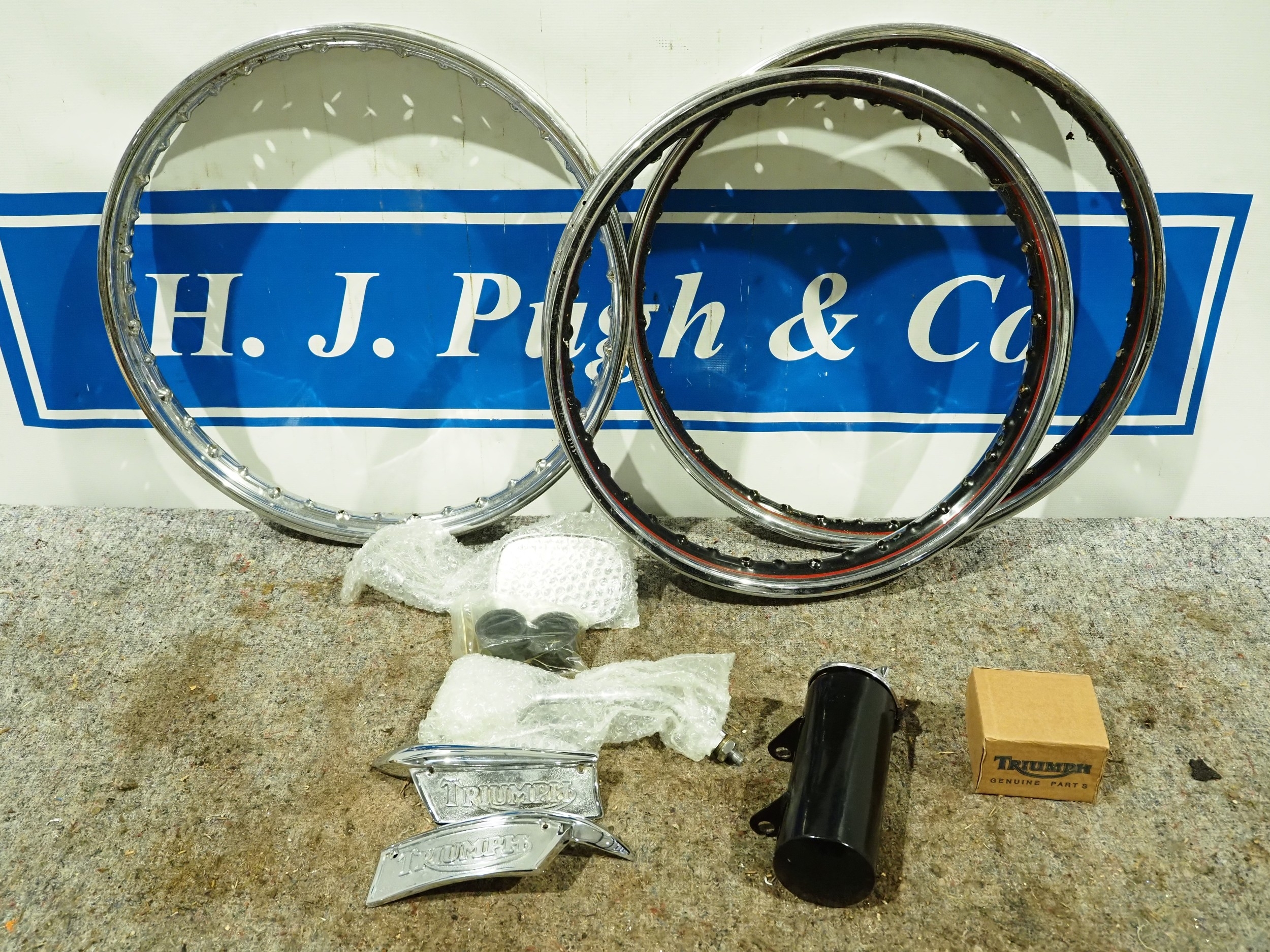 Various Triumph genuine parts to include tank badges, mirror and ...