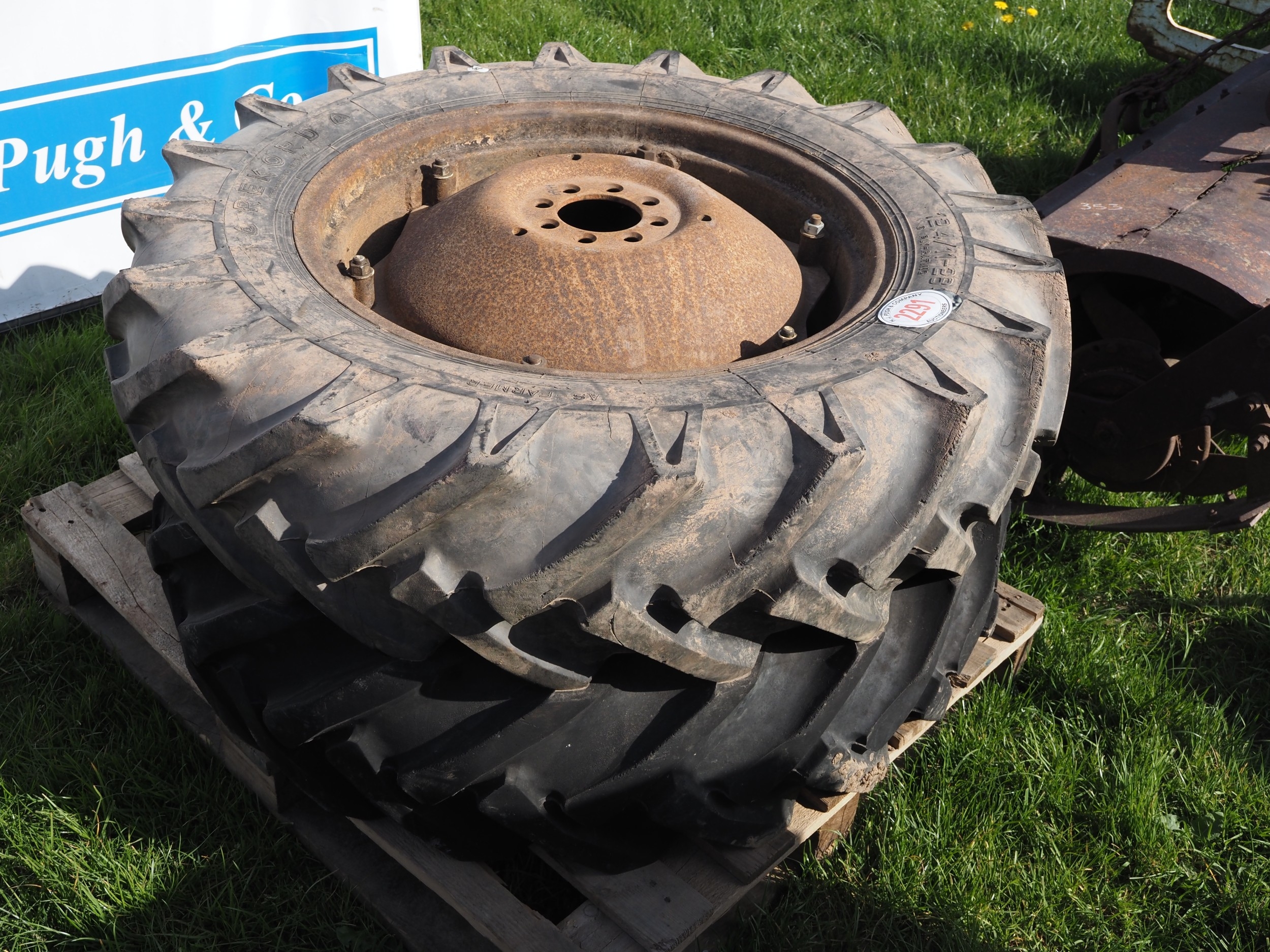 Pair of Massey Ferguson rear wheels and tyres 12.4/11-28