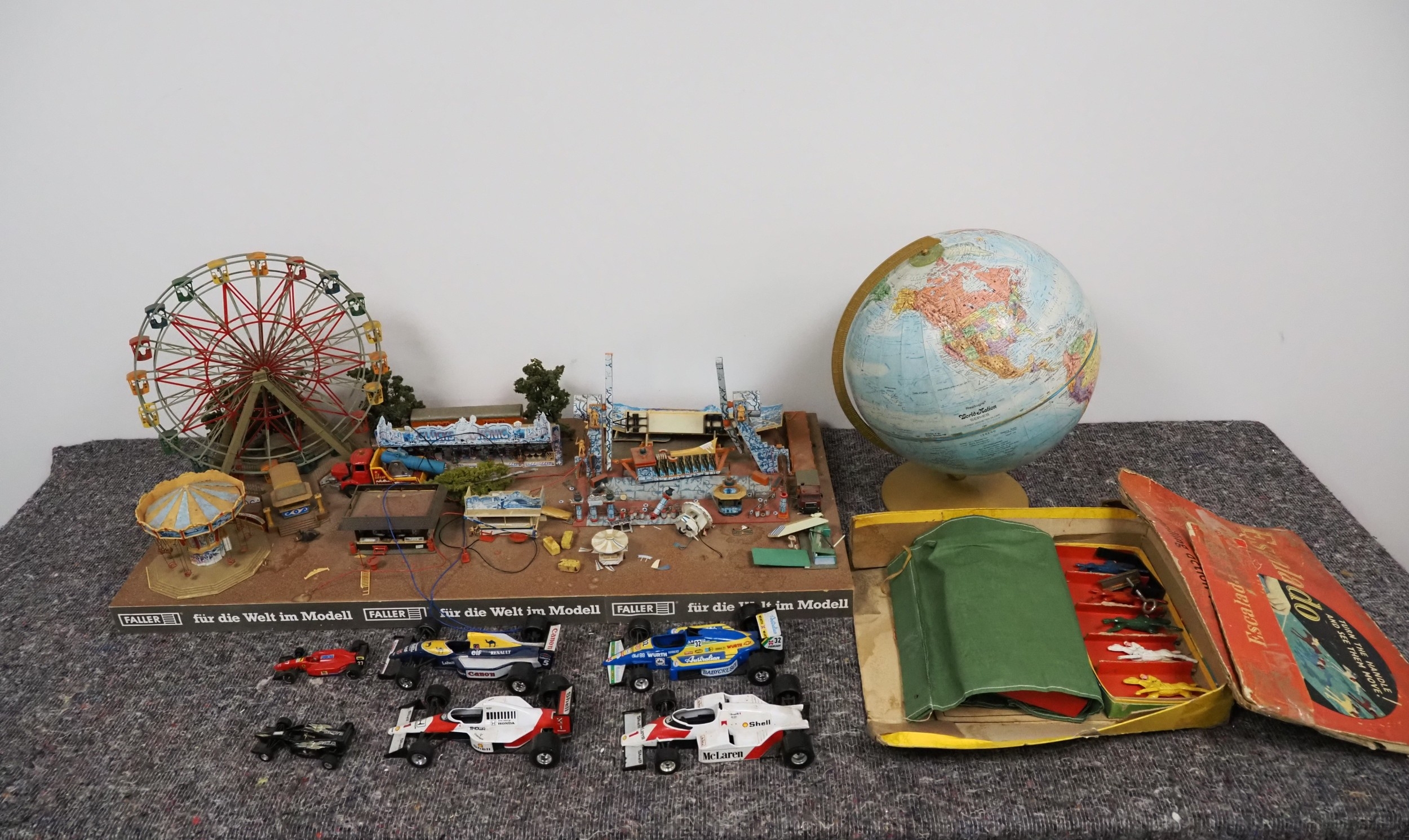 Fairground display, globe, formula 1 model cars and Escalado racing ...