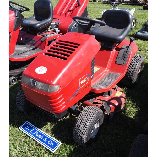 24 - Toro XL 380H ride on mower. Runs and drives. Manual and key in office
