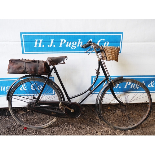 1015 - Raleigh ladies bicycle with front basket and leather bag. 1928