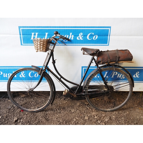 1015 - Raleigh ladies bicycle with front basket and leather bag. 1928