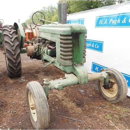 110 - John Deere B tractor. Petrol paraffin. Runs and drives. Fitted with hydraulic top cover, PTO and goo... 