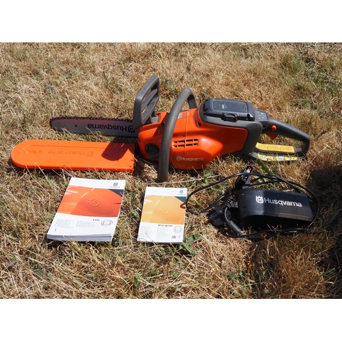 32 - Husqvarna battery chainsaw 120I chainsaw. Working order. C/w charger and handooks