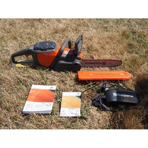 32 - Husqvarna battery chainsaw 120I chainsaw. Working order. C/w charger and handooks