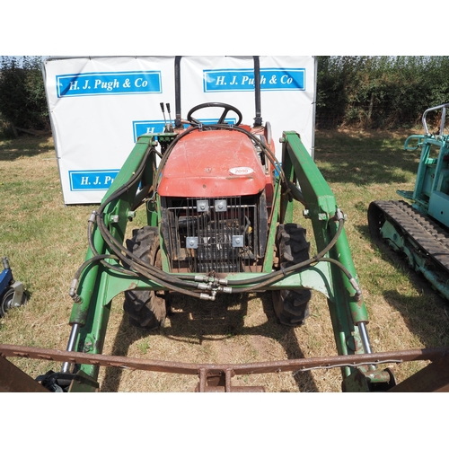 2010 - Mitsubishi MT170 4WD compact tractor with loader, bale spike and roll. Key in office