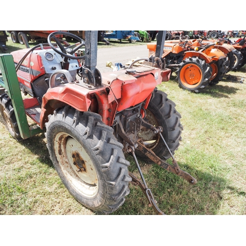 2010 - Mitsubishi MT170 4WD compact tractor with loader, bale spike and roll. Key in office