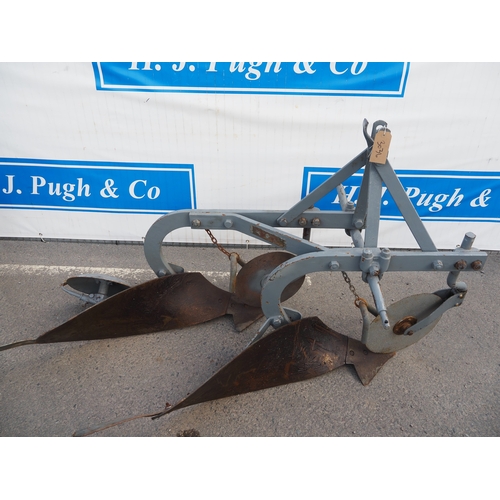 1702 - Ferguson Brown 2 furrow plough with discs and rear wheel. Type D. Badged