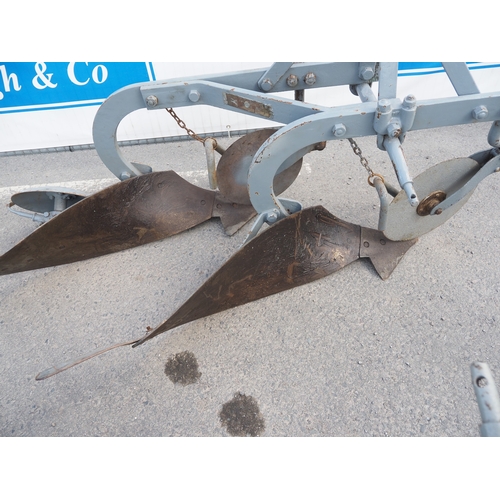 1702 - Ferguson Brown 2 furrow plough with discs and rear wheel. Type D. Badged