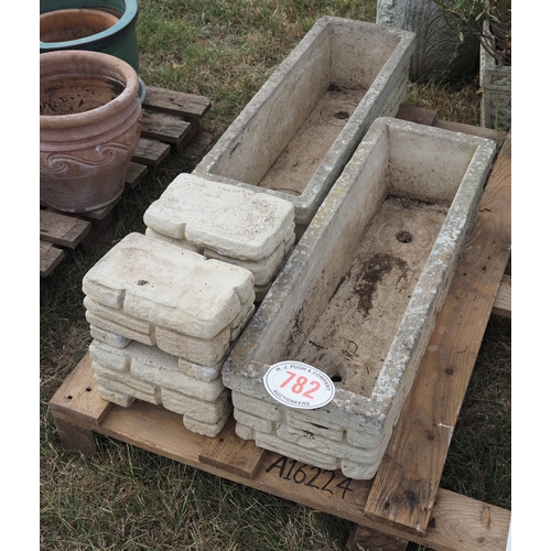 782 - Planters on plinths