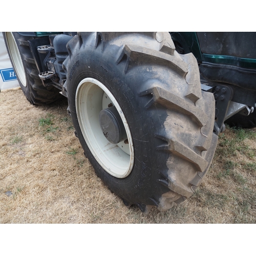 2064 - Valtra Versu T163E tractor. Runs and drives, showing 9074 hours. 50K transmission. C/w set of 14 40k... 