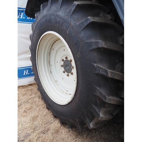 2064 - Valtra Versu T163E tractor. Runs and drives, showing 9074 hours. 50K transmission. C/w set of 14 40k... 