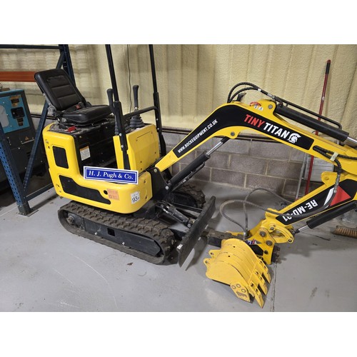 38 - Tiny Titan RE-MD-01 mini digger, complete with attachment, unused.
Key in office