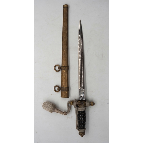 24 - WW2 German Kriegsmarine Officer's Dress Dagger. With a wire wrapped grip with Eagle & Swastika insig... 