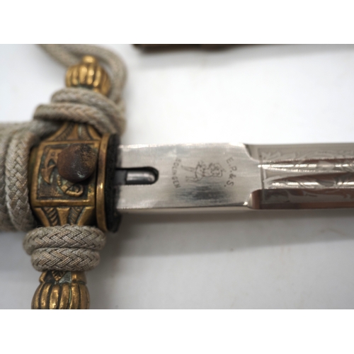 24 - WW2 German Kriegsmarine Officer's Dress Dagger. With a wire wrapped grip with Eagle & Swastika insig... 