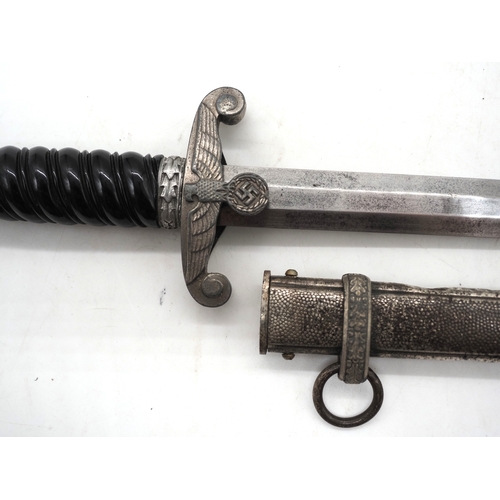 25 - WW2 German Officers Dress Dagger. With a dark wire-bound grip, detailed pommel with Eagle & Swastika... 