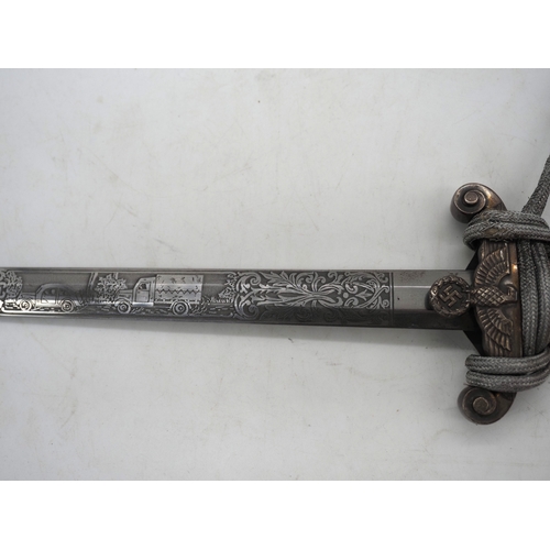 27 - WW2 German Officers Dress Dagger. With orange celluloid type grip. Detailed pommel with Eagle & Swas... 