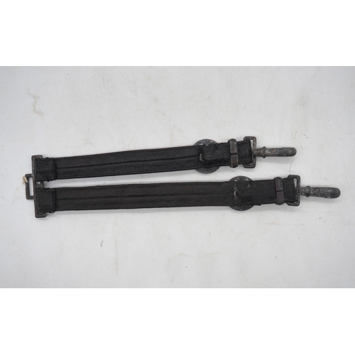 29 - Pair of  Third Reich Teno Officers Dagger Hangers. In black leather with a zinc cogwheel & clips.