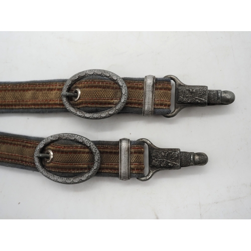30 - WW2 German Officers Dagger Hangers. Fabric straps with oval metal buckles & decorative clips.
