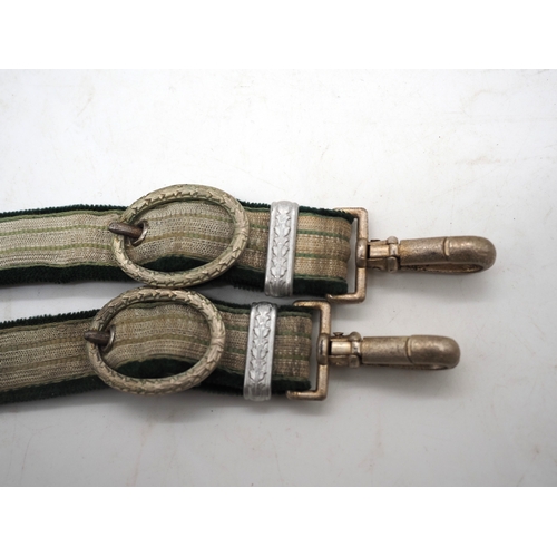 31 - WW2 German Officers Dress Dagger Hangers. Green & cream  woven fabric hangers with decorative oval m... 
