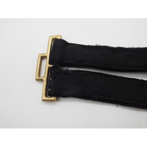 32 - WW2 German Kriegsmarine Officers Dagger Hangers. Black velvet hangers with decorative oval buckles a... 