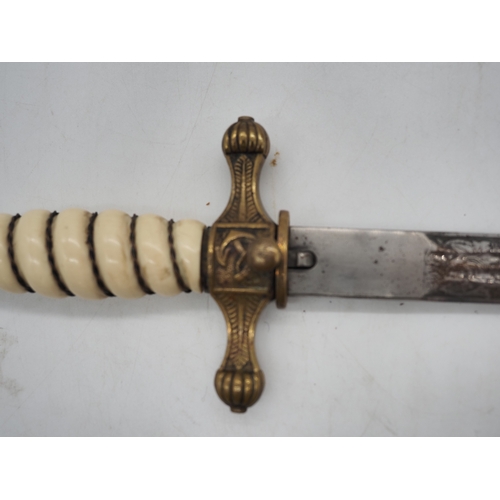 38 - WW2 German Officer's Kriegsmarine Dress Dagger. Featuring a wire bound celluloid grip with eagle and... 