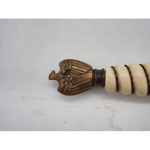 38 - WW2 German Officer's Kriegsmarine Dress Dagger. Featuring a wire bound celluloid grip with eagle and... 