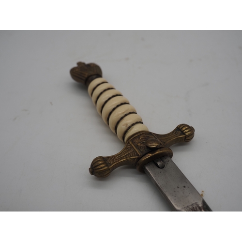 38 - WW2 German Officer's Kriegsmarine Dress Dagger. Featuring a wire bound celluloid grip with eagle and... 