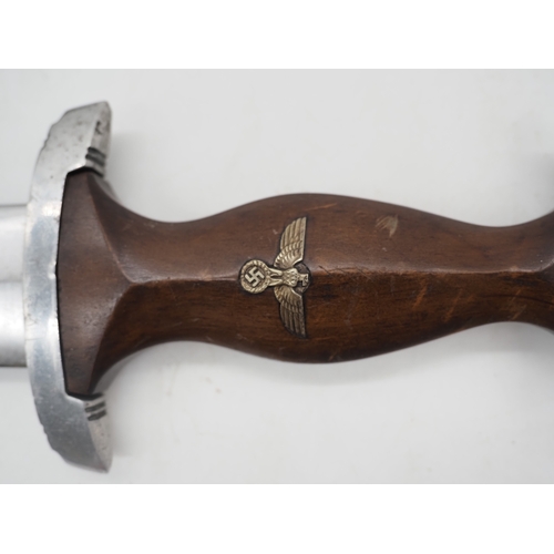 39 - German Third Reich Student Dagger. With a wooden grip and eagle and Swastika emblem complete with me... 