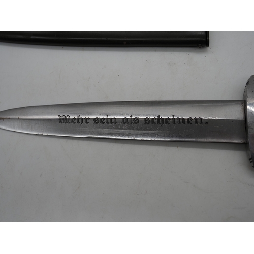 39 - German Third Reich Student Dagger. With a wooden grip and eagle and Swastika emblem complete with me... 