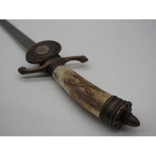 43 - German Hunting Dagger With Decorative Bone Grip Featuring a Brass Insignia of Crossed Rifles. Decora... 