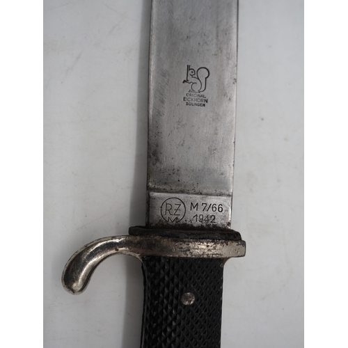 44 - German Hitler Youth Knife. With a black chequered textured grip featuring the diamond Swastika emble... 