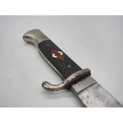 44 - German Hitler Youth Knife. With a black chequered textured grip featuring the diamond Swastika emble... 