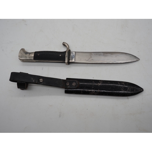45 - German Hitler Youth Knife. With a black chequered textured grip featuring the diamond Swastika emble... 