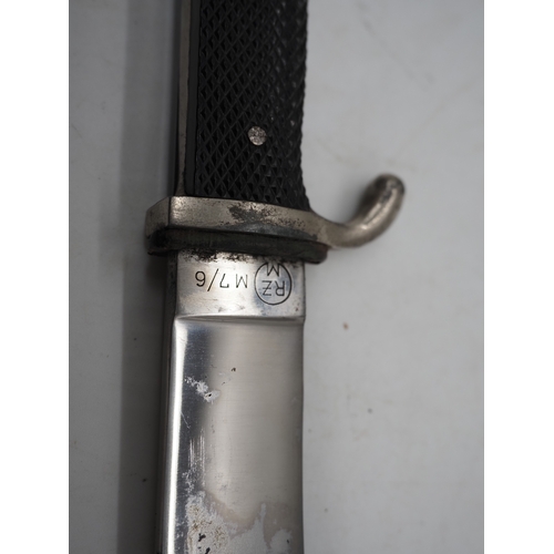 45 - German Hitler Youth Knife. With a black chequered textured grip featuring the diamond Swastika emble... 