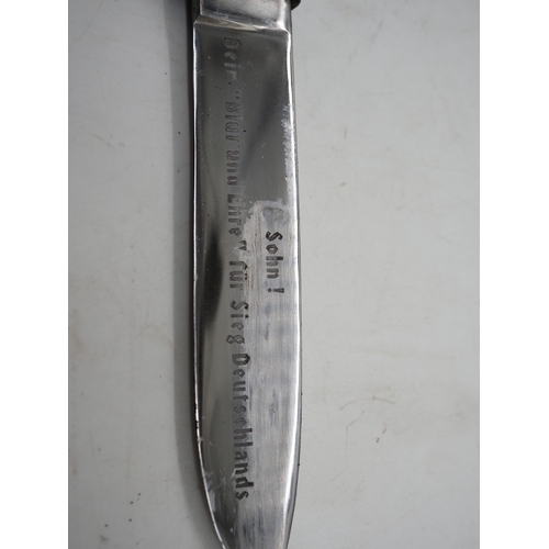 45 - German Hitler Youth Knife. With a black chequered textured grip featuring the diamond Swastika emble... 