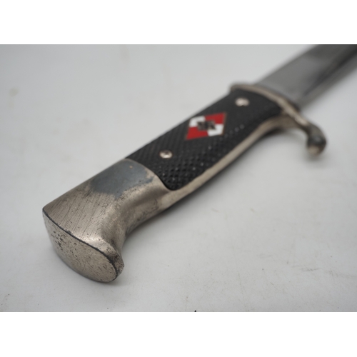 45 - German Hitler Youth Knife. With a black chequered textured grip featuring the diamond Swastika emble... 