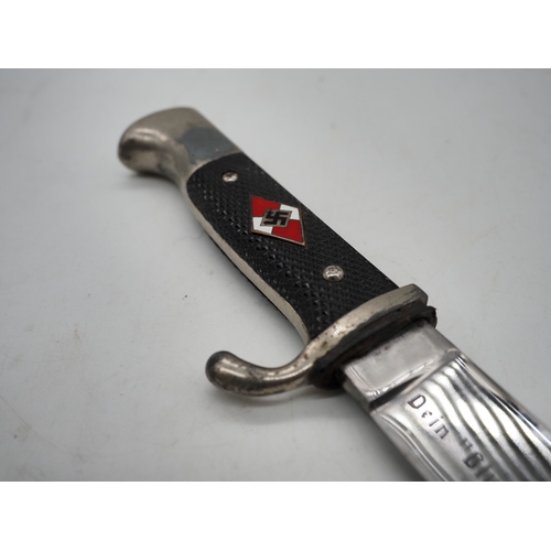 45 - German Hitler Youth Knife. With a black chequered textured grip featuring the diamond Swastika emble... 