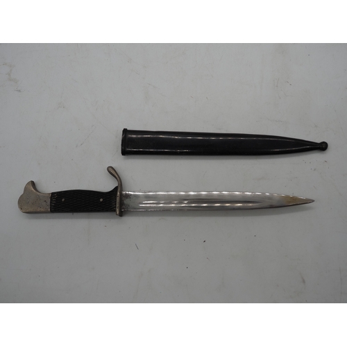 46 - WW2 German miniature K98 Parade Bayonet. Featuring a black chequered textured grip, Swastika emblem ... 