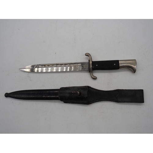 48 - WW2 German Fireman's Dress Bayonet. With a black chequered textured grip, hooked pommel and forward ... 
