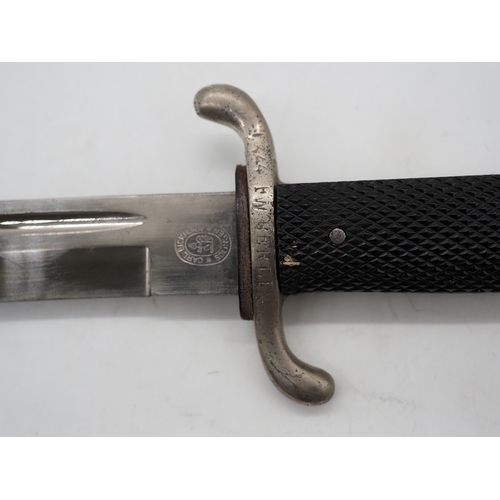 48 - WW2 German Fireman's Dress Bayonet. With a black chequered textured grip, hooked pommel and forward ... 