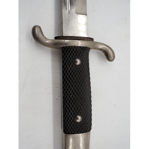 48 - WW2 German Fireman's Dress Bayonet. With a black chequered textured grip, hooked pommel and forward ... 