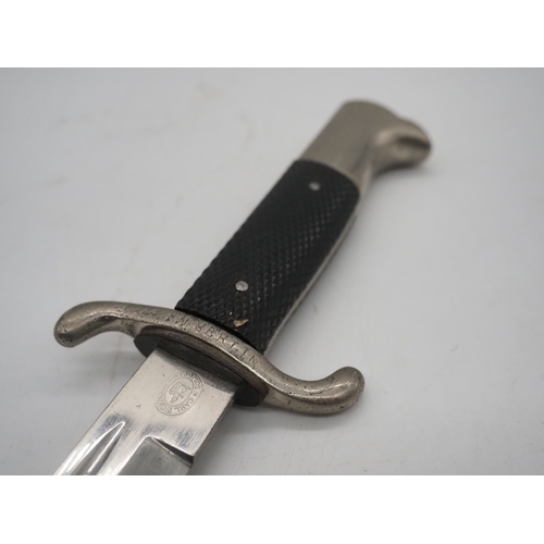 48 - WW2 German Fireman's Dress Bayonet. With a black chequered textured grip, hooked pommel and forward ... 