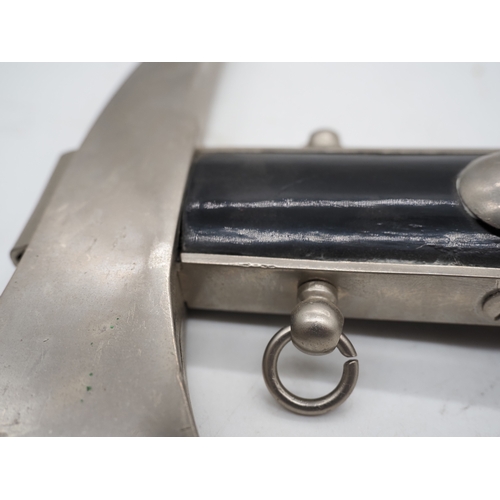 51 - German Ceremonial Fire Brigade Dress Axe. Featuring a polished head and black medal handle with 2 ha... 