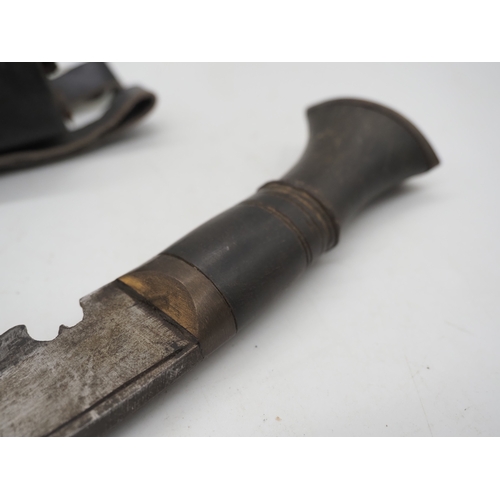 53 - Nepalese Ghurkha Knife. With a dark wooden grip, single edged blade complete with leather scabbard w... 