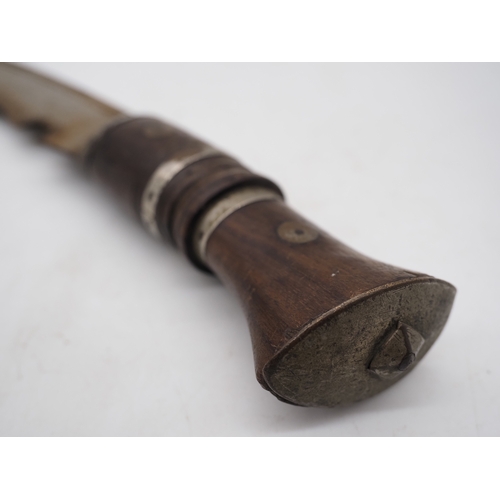 55 - Nepalese Ghurkha Knife. Ornate wooden and metal handle, complete with leather scabbard, single edged... 